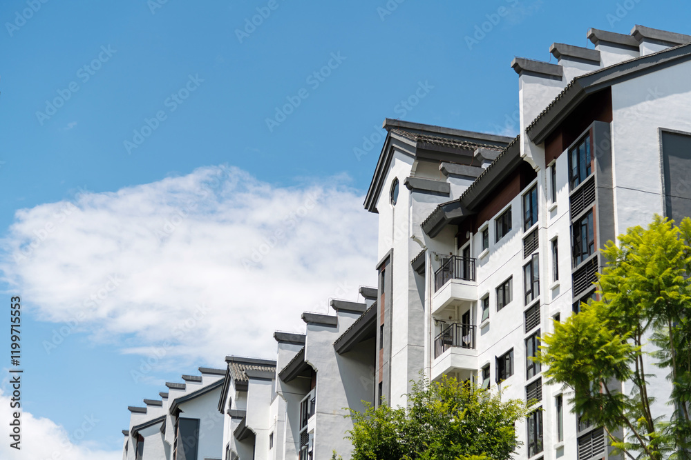 Obraz premium Modern apartment buildings with Chinese style rooftops