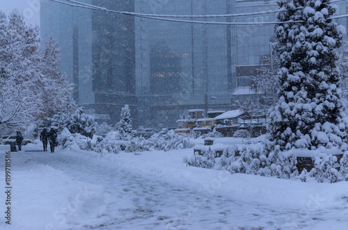 snow storm on the city street photo