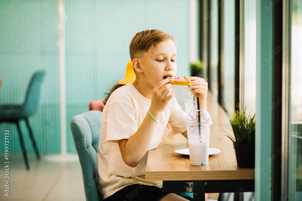 Cute girl and teenager boy eat waffles with ice cream and drinking milkshake in cafe and having fun. Retro style. Cute girl and teenager boy eat waffles with ice cream and drinking milkshake in cafe and having fun. Retro style.
