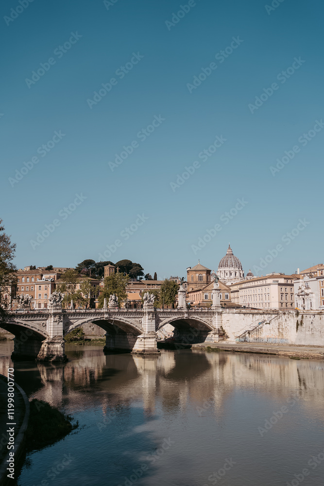 Picturesque View of a Historic Bridge Over the Tiber River in Rome, Italy, with Copy Space Picturesque View of a Historic Bridge Over the Tiber River in Rome, Italy, with Copy Space