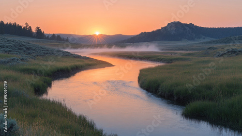 Yellowstone National Park Hayden Valley at sunrise, with mist rolling over the river and wildlife stirring photo