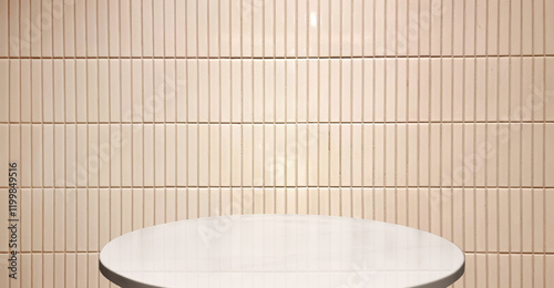 real empty round marble table with beige tiles background used for premium, luxury, deluxe concept. podium under spot light with brown minimal wall tiles pattern background for product displayed.