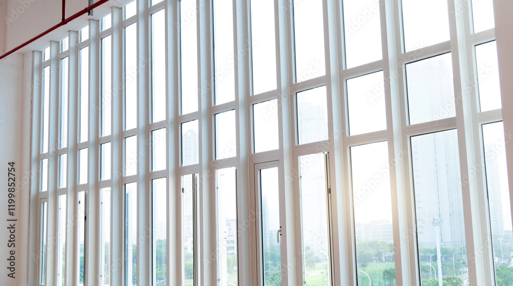 A row of narrow windows in modern building A row of narrow windows in modern building