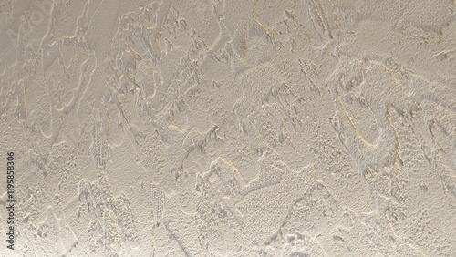 Luxury classic cream white cement texture wall in western restaurant