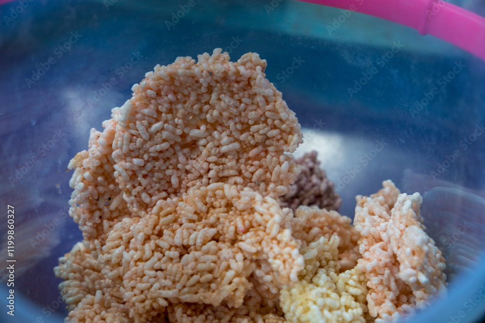 close up of rengginang crackers, fried dried rice making a typical Javanese food called rengginang. close up of rengginang crackers, fried dried rice making a typical Javanese food called rengginang.