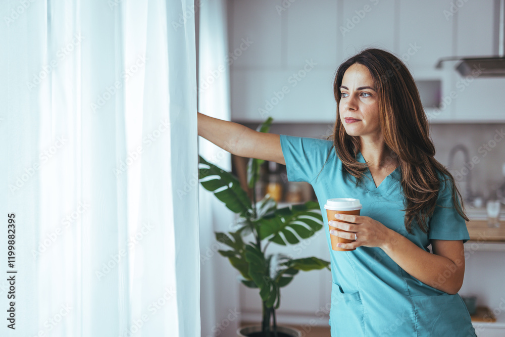 Nurse Relaxing With Coffee Break Looking Out Kitchen Window Nurse Relaxing With Coffee Break Looking Out Kitchen Window