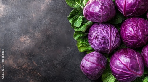 An artistic overhead view of vibrant purple cabbage arranged on a textured surface, highlighting the intricate patterns and freshness of organic produce. photo