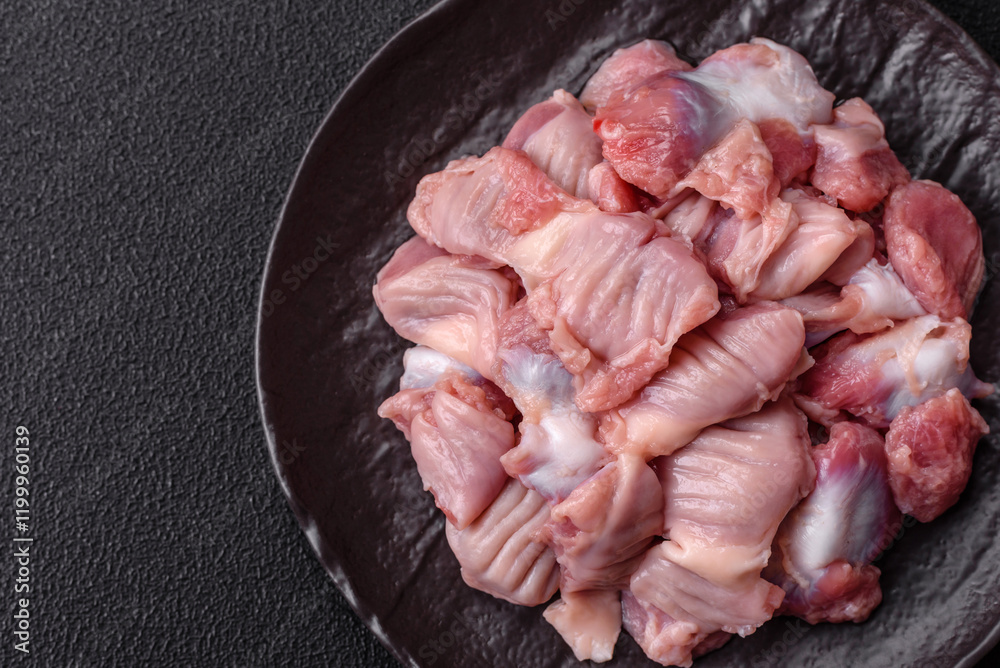 Raw chicken or turkey stomach with salt, spices and herbs Raw chicken or turkey stomach with salt, spices and herbs