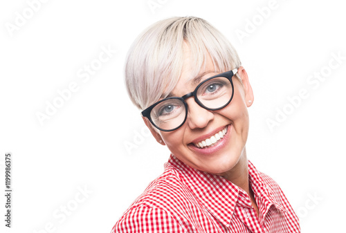 Face of nice middle aged woman keeps chin on shoulder, isolated on white background. Closeup portrait of a cheerful woman .