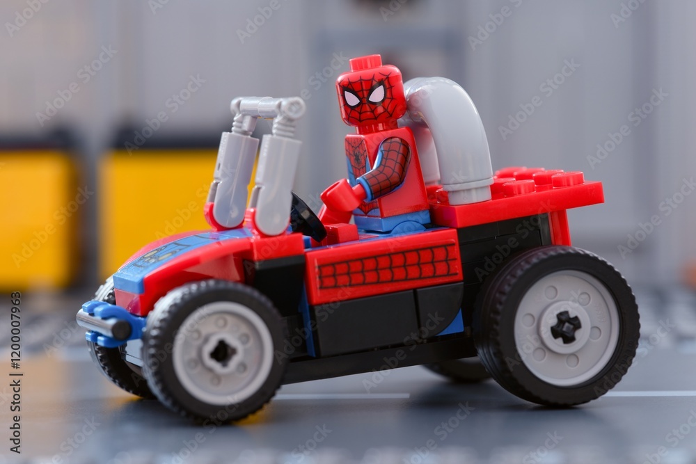 Naklejka premium Tambov, Russian Federation - January 05, 2025 Lego Spider-Man minifigure driving his buggy
