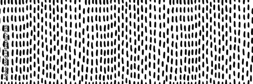Seamless pattern with small vertical dashes. Black hand drawn lines on a white background. Great for digital design, fabric prints, packaging, stationery, and modern home decor. Vector illustration