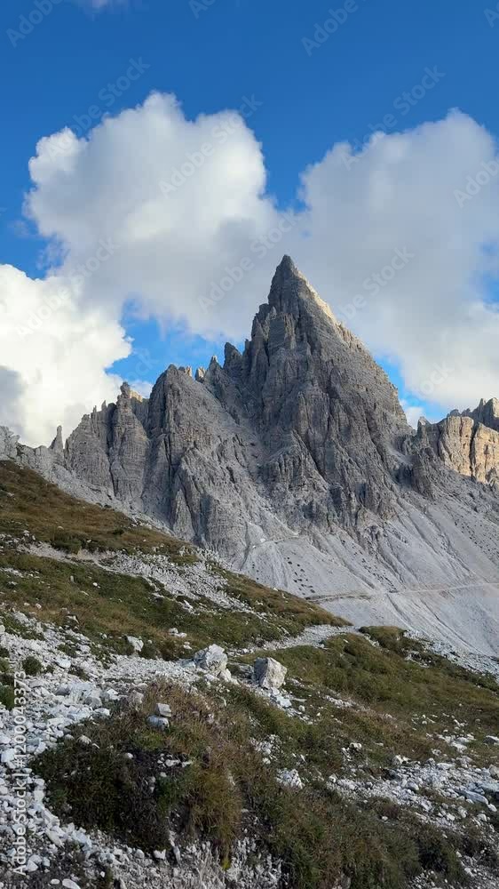 hiking narrow pathway and climbing Tre Cime di Lavaredo Dolomites mountain. summer adventure journey in nature. Travel exploring Alps, Dolomites, Italy hiking narrow pathway and climbing Tre Cime di Lavaredo Dolomites mountain. summer adventure journey in nature. Travel exploring Alps, Dolomites, Italy