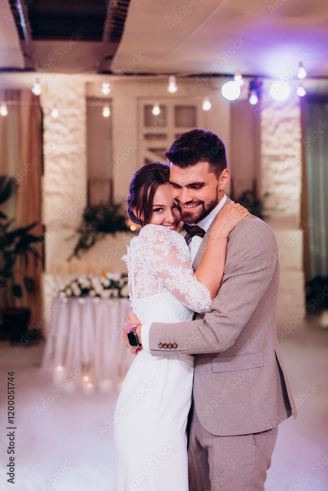 the first dance of the bride and groom inside a restaurant the first dance of the bride and groom inside a restaurant