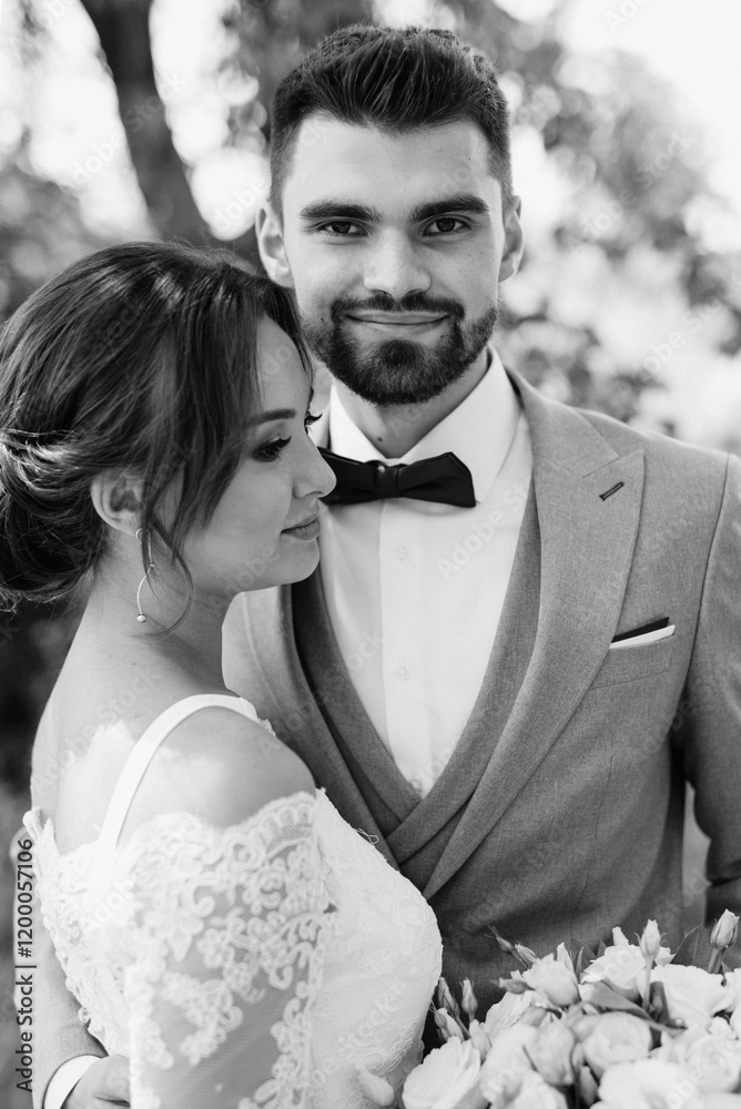 guy and a girl newlyweds are walking in the forest
