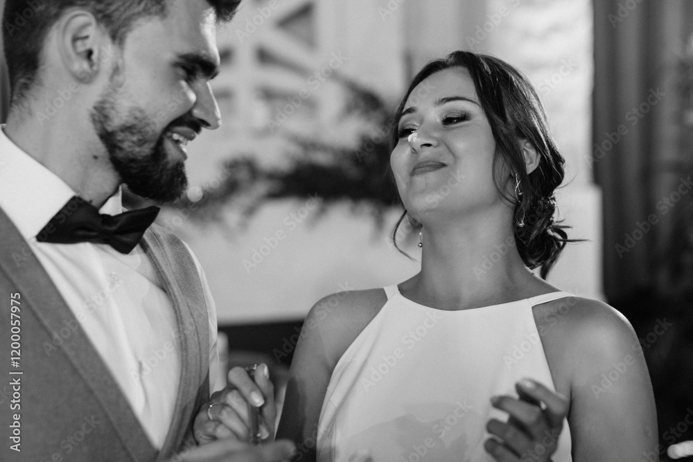 the first dance of the bride and groom inside a restaurant