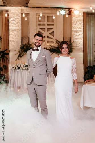 the first dance of the bride and groom inside a restaurant