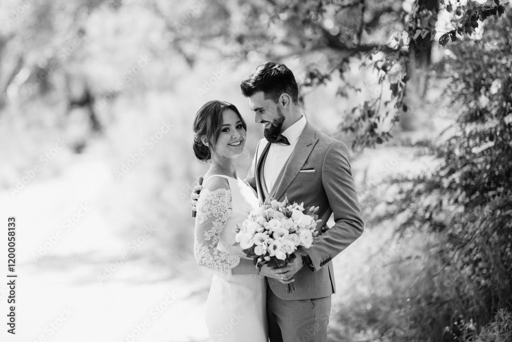 guy and a girl newlyweds are walking in the forest