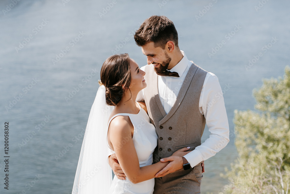 bride blonde girl and groom near the river