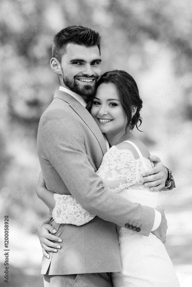 guy and a girl newlyweds are walking in the forest