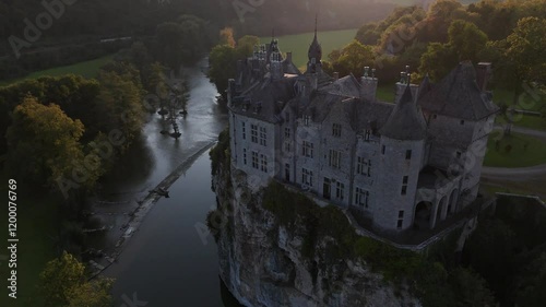 Discover the enchanting beauty of Walzin Castle at sunset