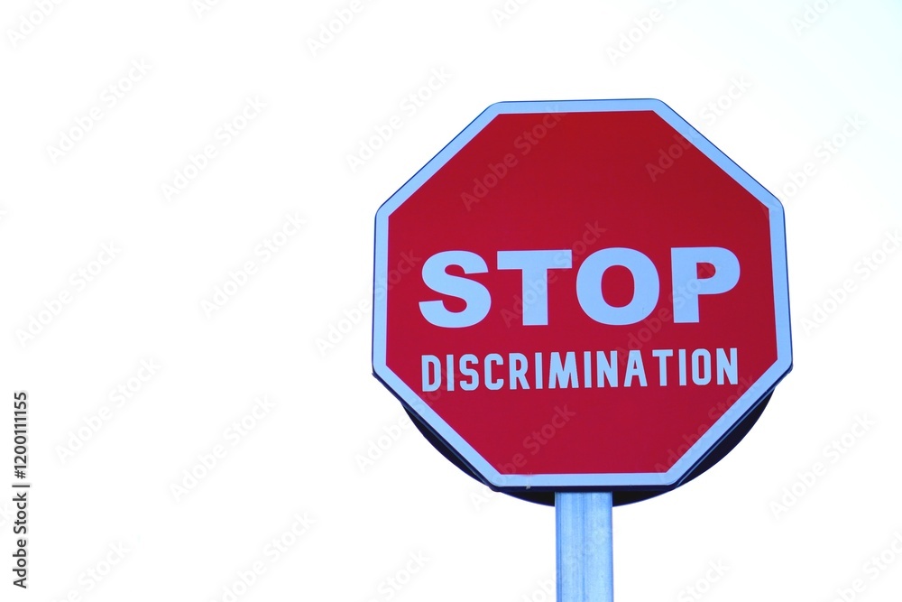 stop discrimination. activism for equal rights. letters written on a stop sign. stop discrimination. activism for equal rights. letters written on a stop sign.