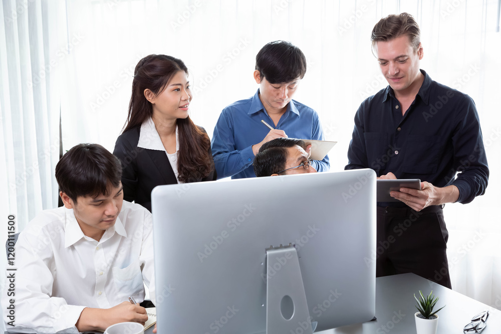 Group of diverse office worker employee working together on strategic business marketing planning in corporate office room. Positive teamwork in business workplace concept. Prudent Group of diverse office worker employee working together on strategic business marketing planning in corporate office room. Positive teamwork in business workplace concept. Prudent