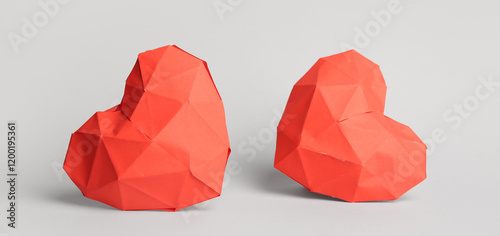 Red hearts made of paper on...