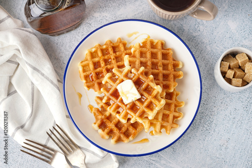Plate of tasty waffles with...