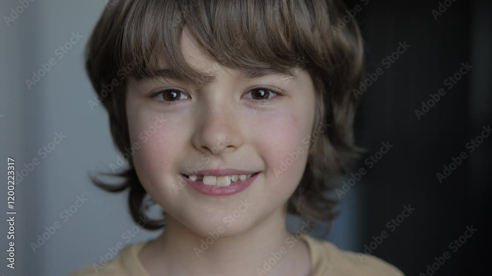 Portrait Little Boy Looking at Camera. Face Funny Contemplative Child. Close-up Portrait of Confident Inquisitive Laughs Happy Caucasian Teenage Boy. Eyes of Smiling Schoolboy. Positive Health Life. Portrait Little Boy Looking at Camera. Face Funny Contemplative Child. Close-up Portrait of Confident Inquisitive Laughs Happy Caucasian Teenage Boy. Eyes of Smiling Schoolboy. Positive Health Life.