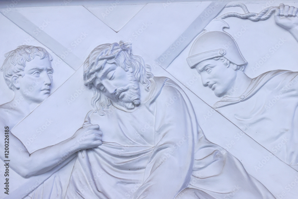 Fototapeta premium The Redeemer Church (or Notre Dame Cathedral). Way of the cross. 9th Station: Jesus falls a third time. Ho Chi Minh City. Vietnam.