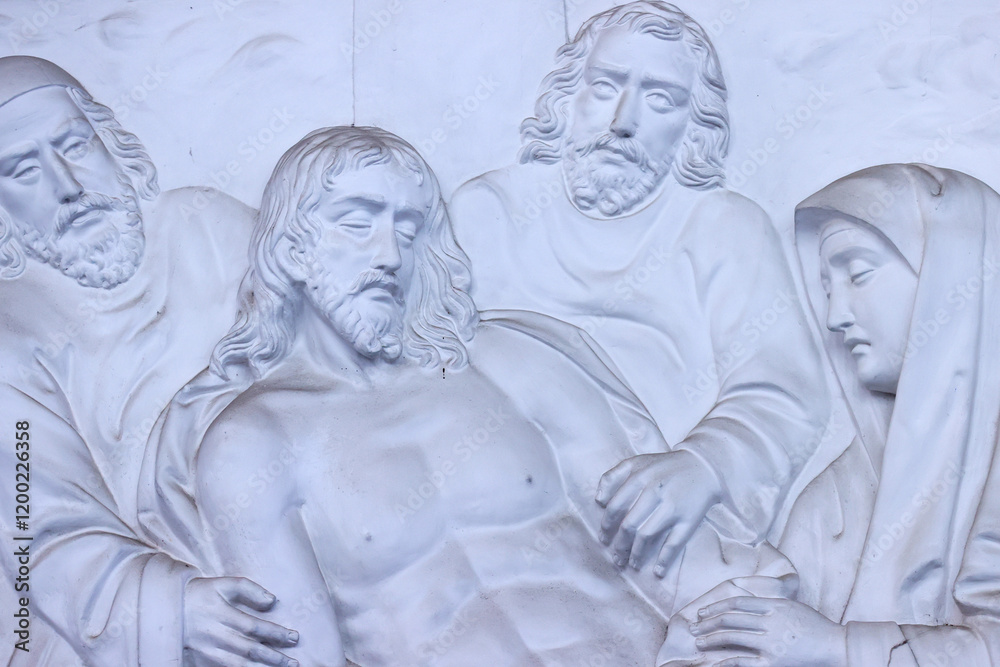 Naklejka premium The Redeemer Church (or Notre Dame Cathedral). Way of the cross. 13th Station: The body of Jesus is taken down from the cross. Ho Chi Minh City. Vietnam.