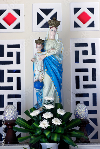 St Francis Xavier, catholic church.  Virgin Mary and child.  Hue. Vietnam. photo