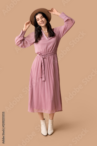 Beautiful young woman in st...
