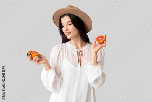 Beautiful young woman in st...