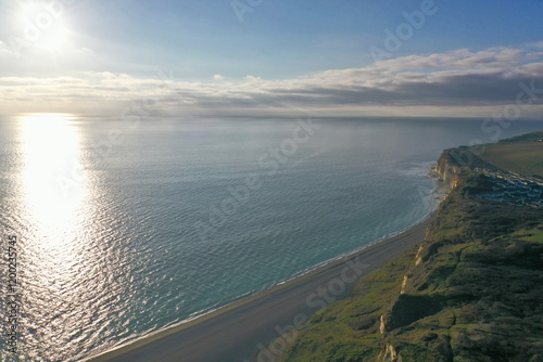 Aerial view of coastal cliffs on a clear calm sunny day