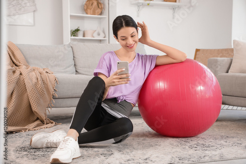 Sporty young woman with fit...