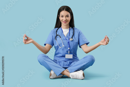 Young female doctor meditat...