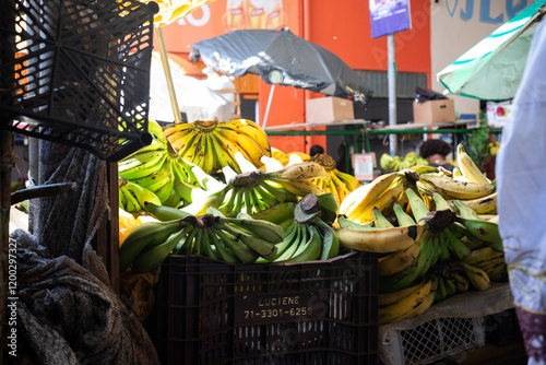 Ripe bananas for sale. Fruit of the Musacea family rich in fiber and vitamins. photo