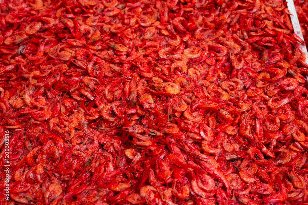 Fototapeta premium Dried shrimp for sale at a stand. Crustacean rich in protein, omega 3, B vitamins and other nutrients.