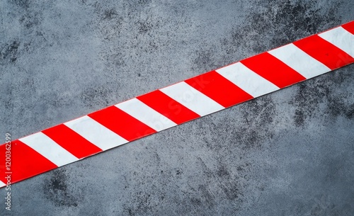 Diagonal safety tape with red and white stripes