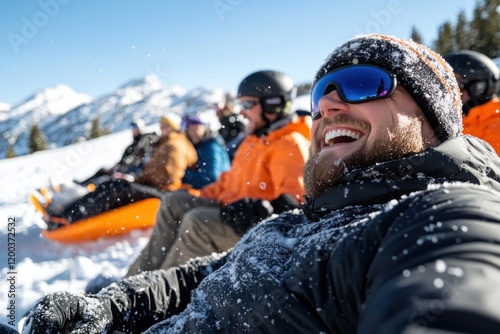 A group of friends indulge in thrilling outdoor activities on a snow-covered hill, exemplifying spirit, laughter, and a zest for winter adventure amidst a breathtaking background. photo