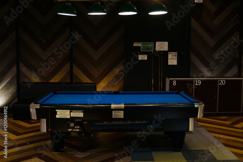 Pool table room with notification notice and sticker at the wall