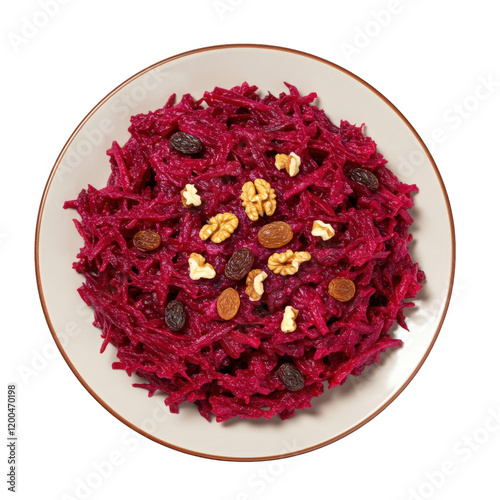 Fresh grated beet salad with walnut pieces and raisins on a plate