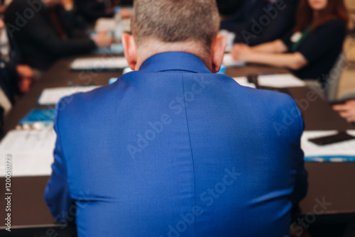 Board of directors in meeting room, Company executive director and management at the table, global corporation boss, parters team and investors, CEO back view, discussing project and planning strategy photo