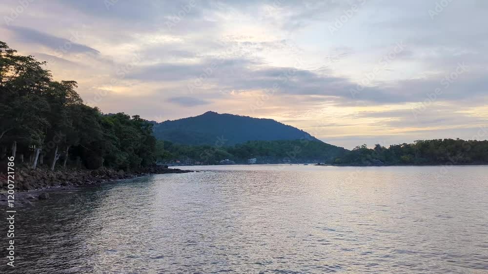 Peaceful hazy sunset view at Iboih on tropical island of Pulau Weh Indonesia with ocean views Peaceful hazy sunset view at Iboih on tropical island of Pulau Weh Indonesia with ocean views