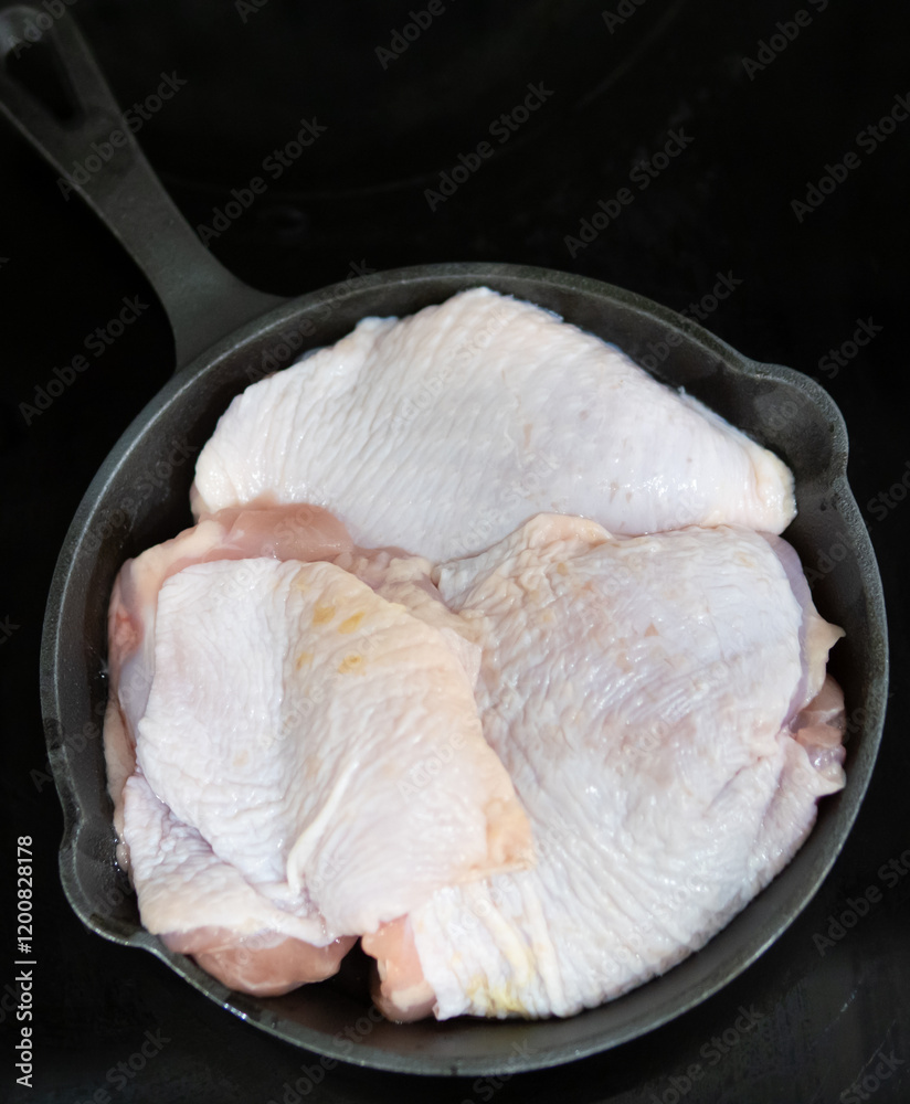 Uncooked chicken pieces