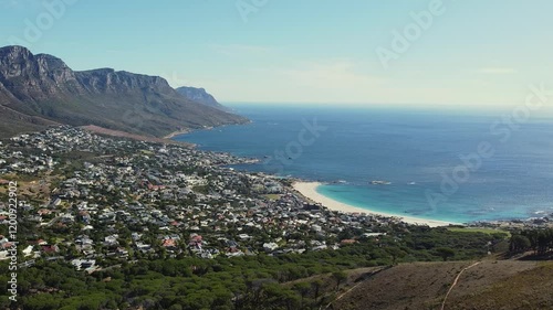 Wallpaper Mural Experience the Breathtaking Aerial Beauty of Cape Town: Stunning 4K Drone Footage Capturing Majestic Mountains, Vibrant Urban Life, and the Sparkling Sea Under a Clear Blue Sky on Perfect Sunny Day Torontodigital.ca