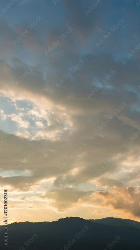 Twilight and dawn sky with cumulus cloud vertical time lapse in an evening. Twilight and dawn sky with cumulus cloud vertical time lapse in an evening.