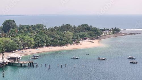 Senggigi Beach and ferry terminal on scenic Lombok coastal, Indonesia drone. Sunny day photo