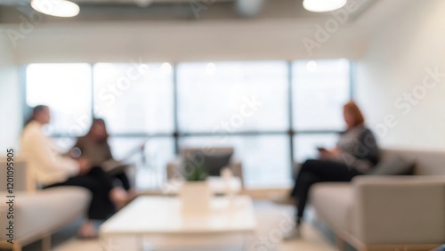 Office Lounge Networking Blur: A cozy office lounge scene with blurred professionals networking in a relaxed atmosphere.
